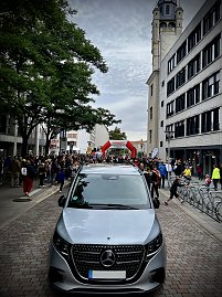Bilder von den Impressionen am Stand, am Streckenrand und vom Läuferteam.