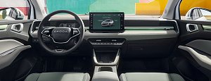 Innenraum des �koda Epiq mit digitalem Cockpit, gro&szlig;em Zentraldisplay und modern gestaltetem Armaturenbrett in Mint- und Graut&ouml;nen.